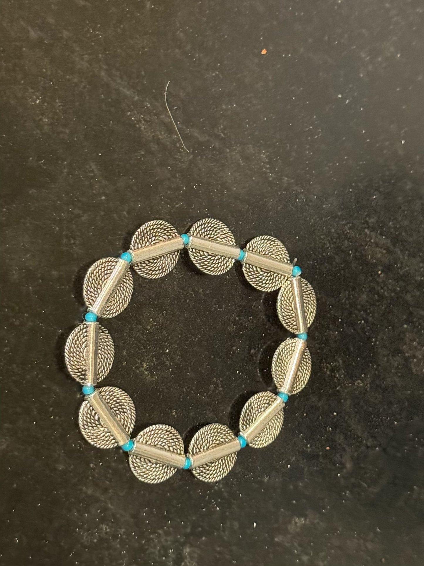 Beautifully designed chrome bracelet by Taytem Barth