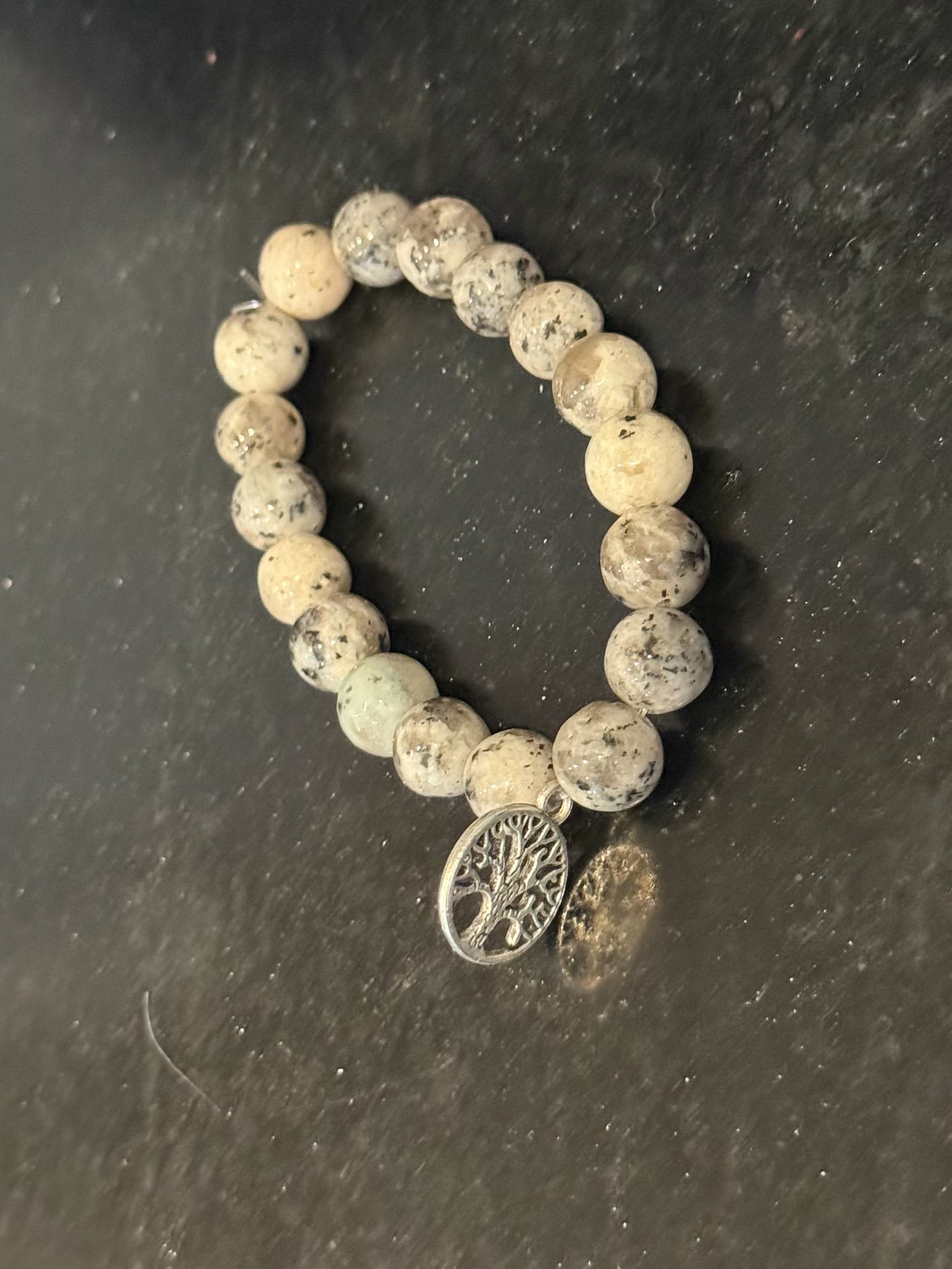 Beautifully designed heritage charm bracelet by Taytem Barth