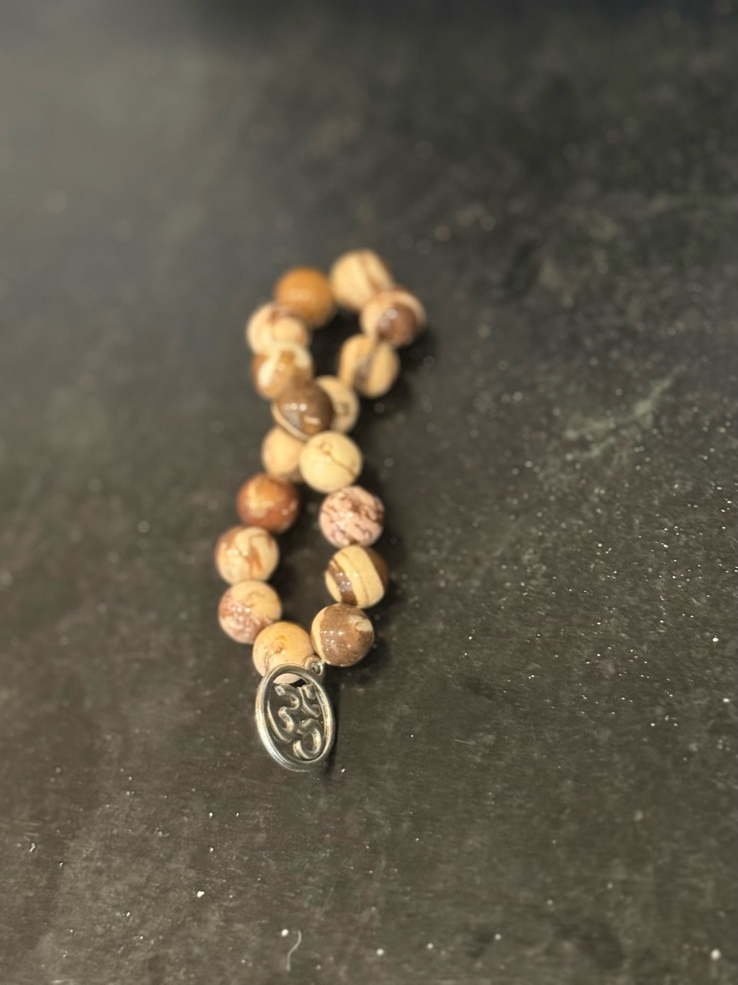 Beautifully designed heritage charm stone bracelet by Taytem Barth