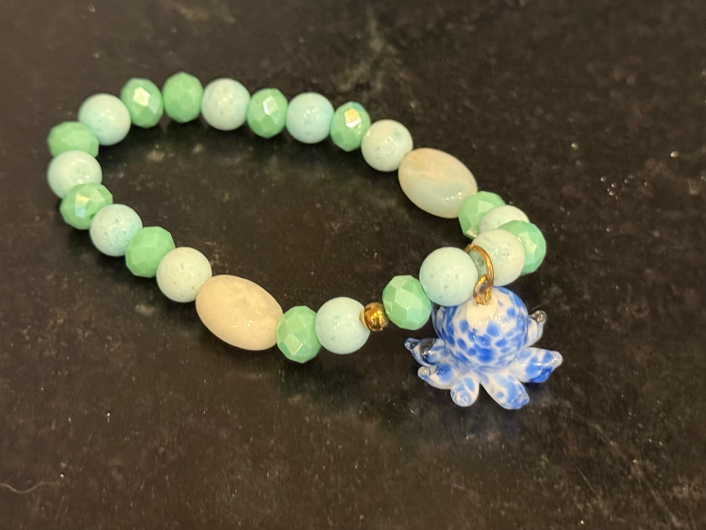 Beautiful octopus charm bracelet by Taytem Barth