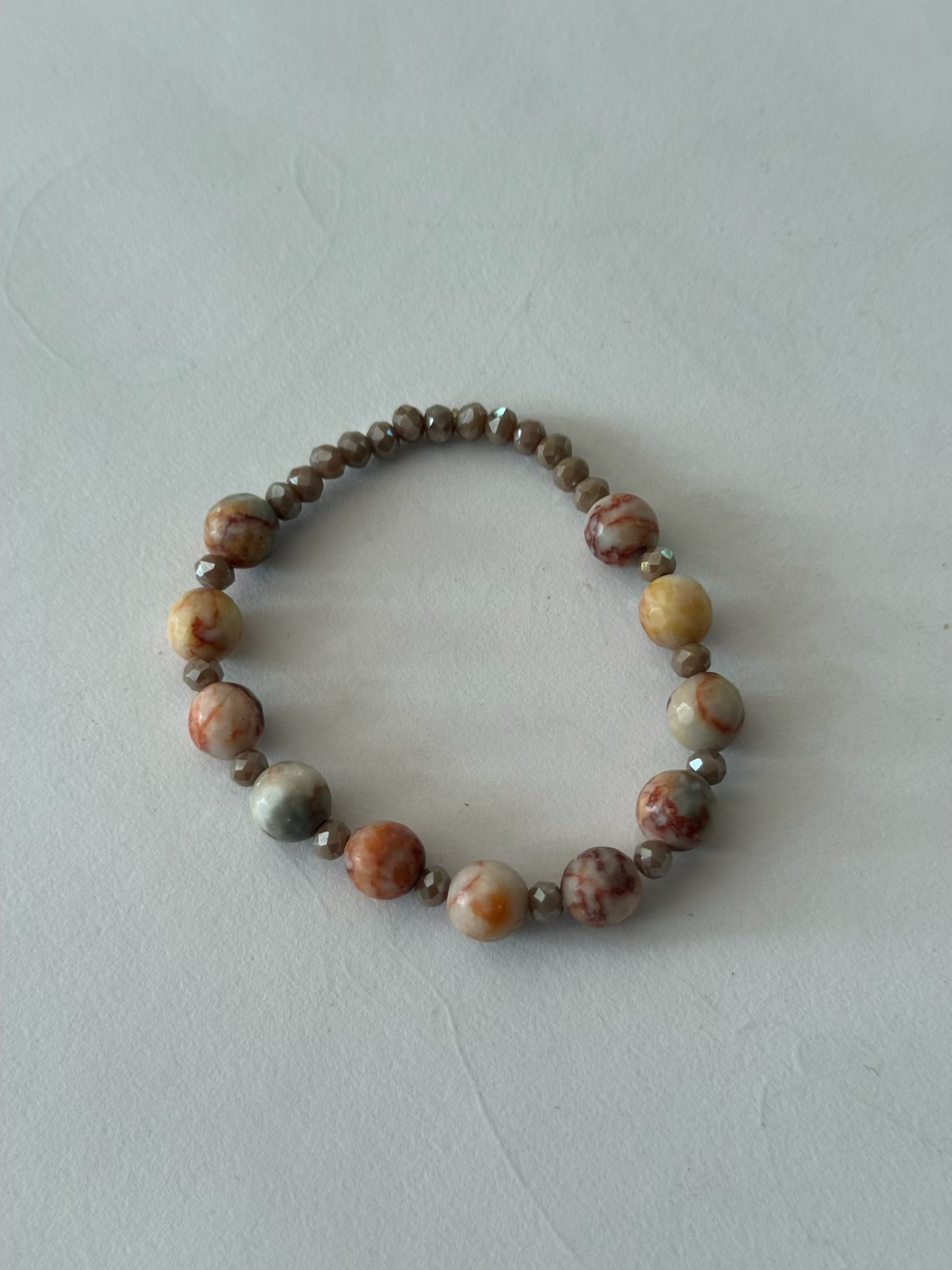 Original handmade earth colored smooth glass bracelet
