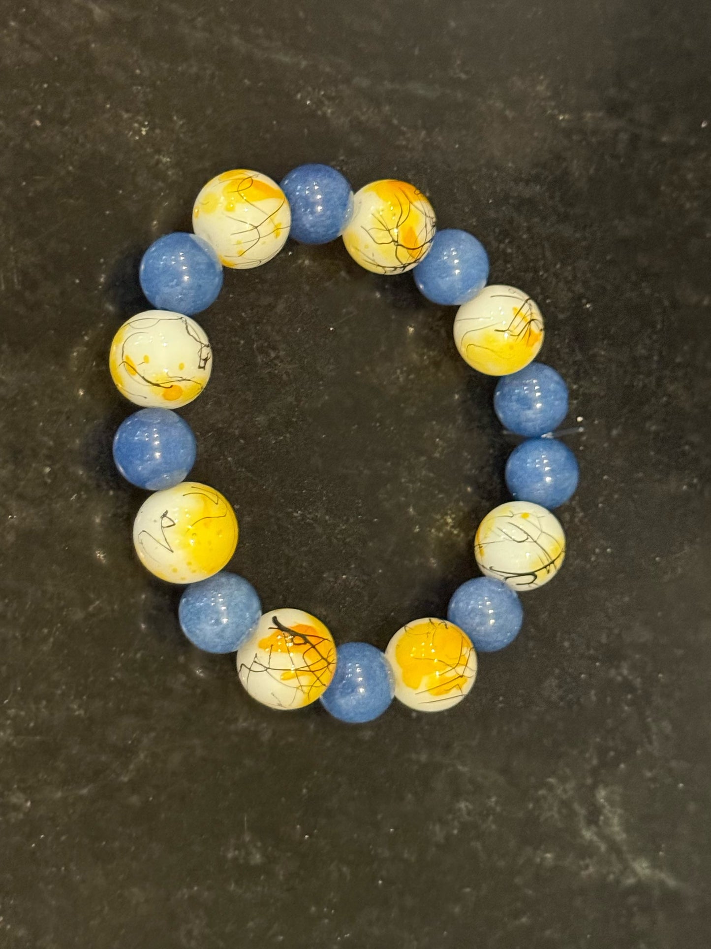 Beautiful smooth stone and glass bracelet by Taytem Barth